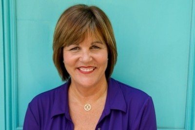 suzy standing in front of door 620x9321