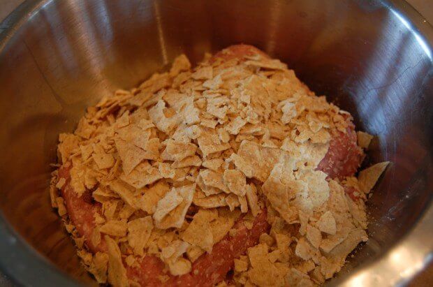Add in the crushed tortilla chips.