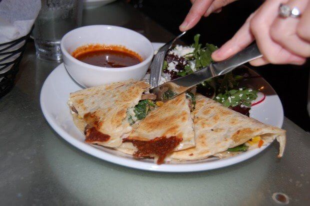 Why not dig into a crowd-pleasing veggie quesadilla, packed with spinach, mushrooms, charred corn, goat cheese and roasted tomato garlic salsa. Served along side is a salad of fresh greens, radish, jicama, cotija and lime - COOL FRIJOLES!