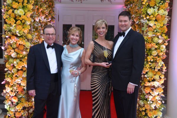 The flower tunnel at Les Bijoux, (left to right) Lewis Williamson, Barbara Williamson, Chantal Johnson, Jeff Johnson. Photo credit: Whitney McNeill