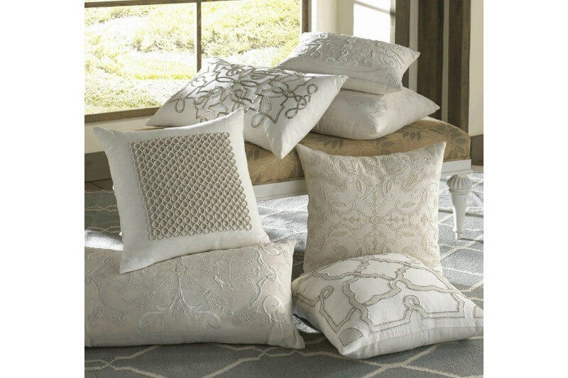 Spritz linens and pillows with a fresh scent to create a lovely guest room retreat.