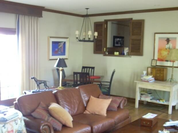 "Before" shot of the family room. The passthrough is into the kitchen.