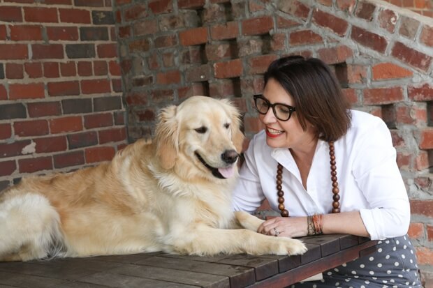 The Bencich family dog, Annie, often roams Square Feet Studio, adding to the family feel.