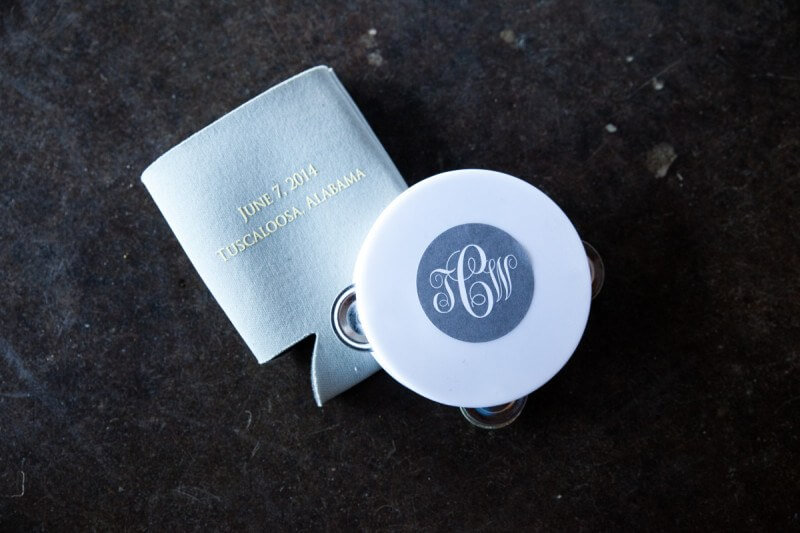 Monogrammed tambourines were a fitting favor for this harmonious couple!
