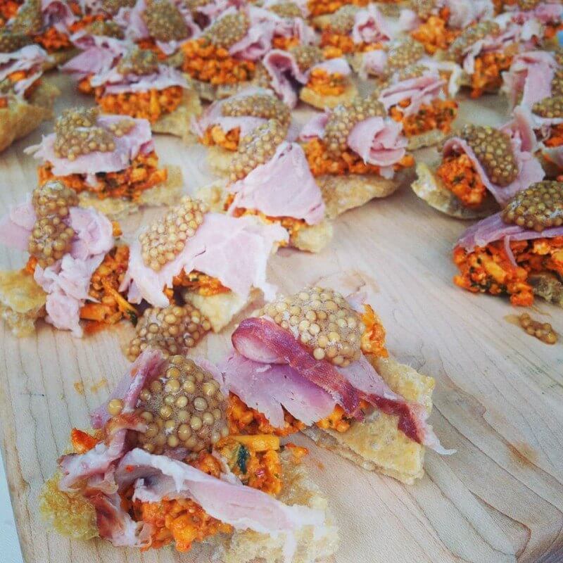 Take a look at their Taste of Uptown offering of chiccarone with kimchi pimento cheese, country ham, and pickled mustard seed. Wow! 