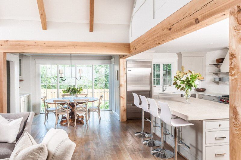 The kitchen, dining area and family room are open and spacious allowing the family to move about. Christopher Architecture and Interiors