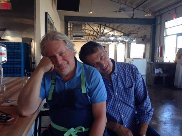 Jonathan Waxman and Howard Greenstone are bushed but happy sitting at the kitchen bar. Notice the white oak counter.