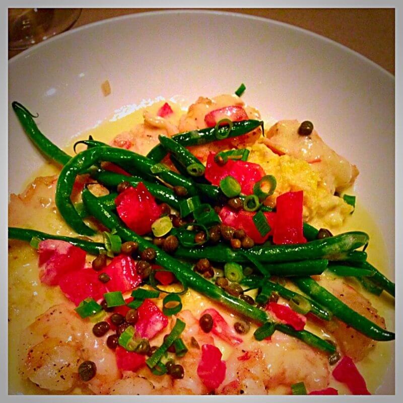 The shrimp and grits is always spot on, served with little green beans, tomatoes, capers and scallions.