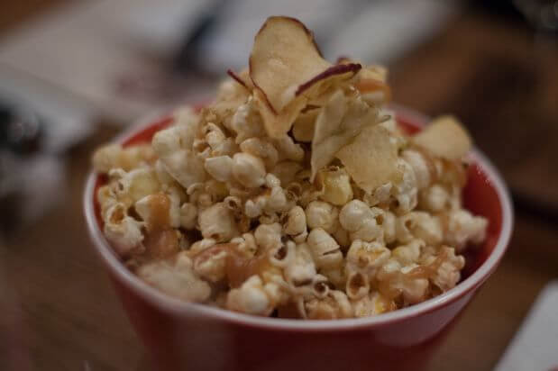 Chef’s popcorn with caramel, sea salt, and apple crisps