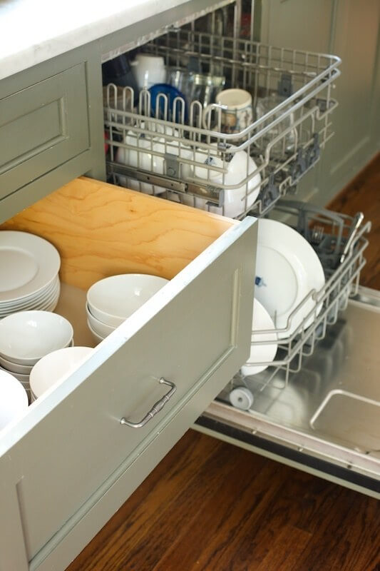 Dishes live in the drawer next to the dishwasher making for easy unloading.