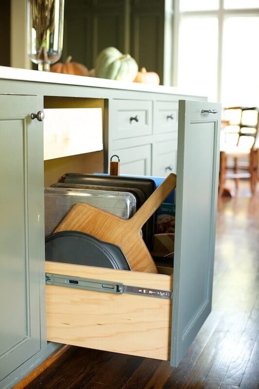 Another handy hideaway for baking sheets and miscellaneous cooking utensils.