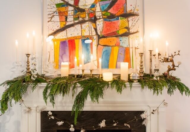 This fireplace decked out for Christmas is beautiful.