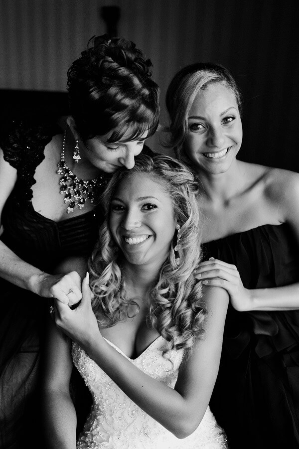 Hometown NBA Star marries in Louisville in a lavish wedding. Megan, her mother, and sister enjoy a private moment before the ceremony.