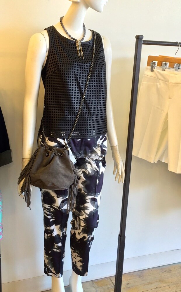 perforated leather top with fringe bag