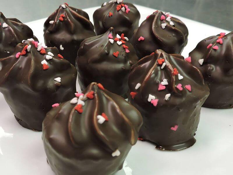 Frost Bites, strawberry cupcakes dipped in dark chocolate at the Frost Bake Shop | Image credit: Frost