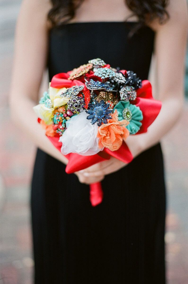 The bridesmaid's bouquet of vintage brooches | Photo courtesy of Southern Event Planners | Photo credit: Josh Malahy