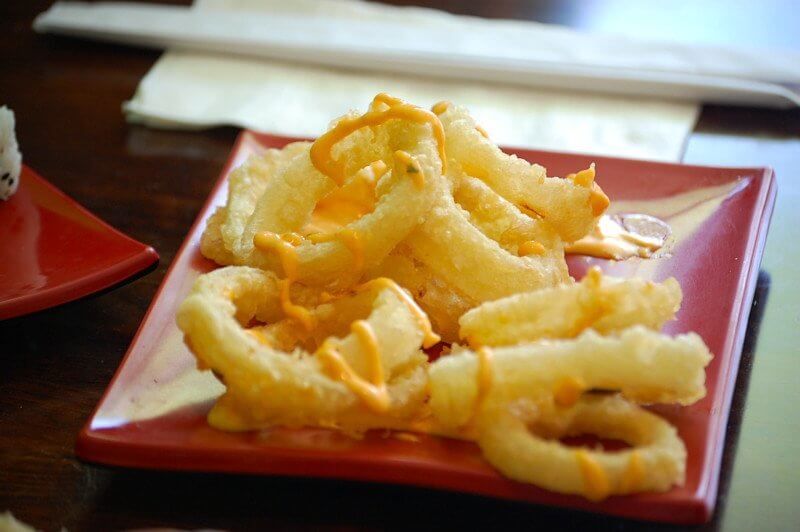 Tempura battered onion rings are crispy and delicious.