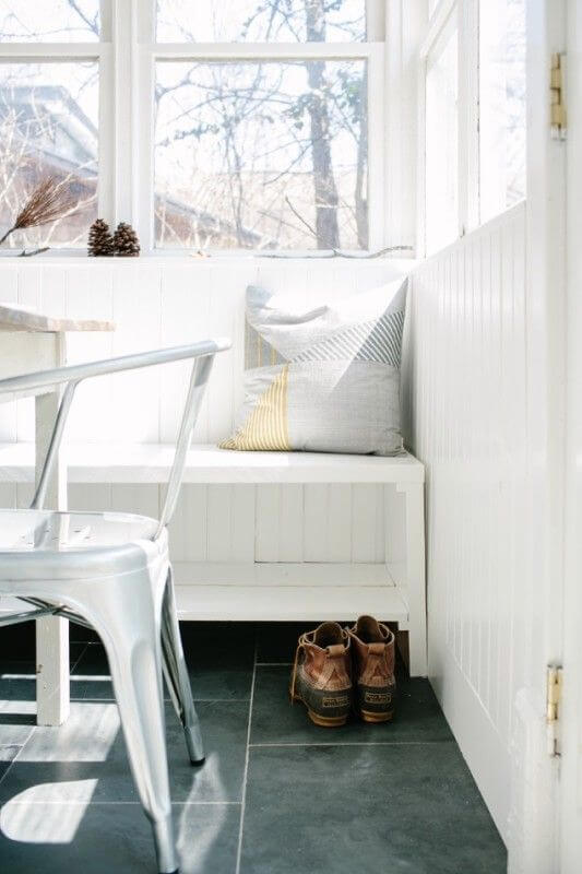 Snuggle up at this cozy breakfast booth designed by Cromwell + Co.