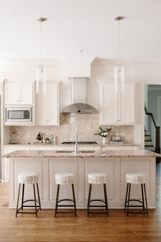 A clever kitchen facelift brings light and energy into the space.