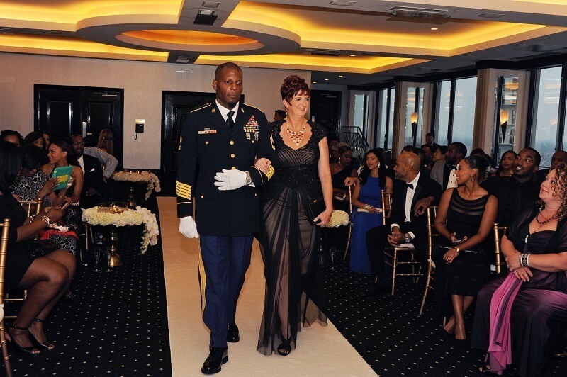 Hometown NBA Star marries in Louisville in a lavish wedding. Megan's parents walk down the aisle. Megan's father wore his full military dress uniform.