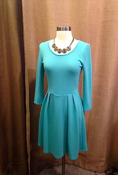 This simple turquoise dress from Pieces Boutique is sweet and feminine