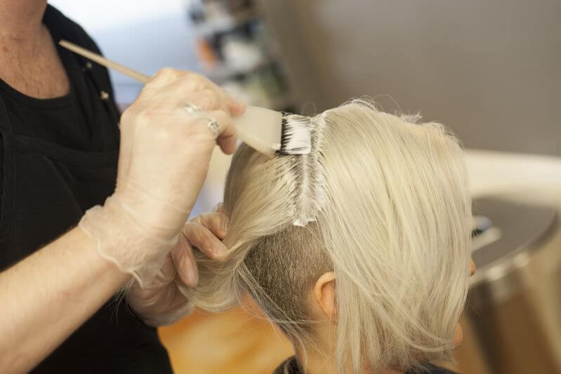 Silver Blonde for Spring: Nick meticulously applies color to all roots on her scalp.