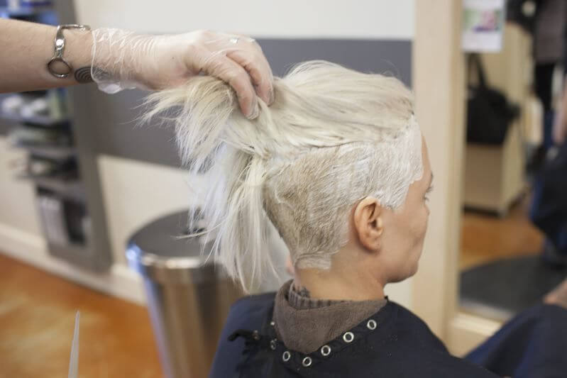 Silver Blonde for Spring: Then he applies color to all her shorter shaved areas of her scalp.
