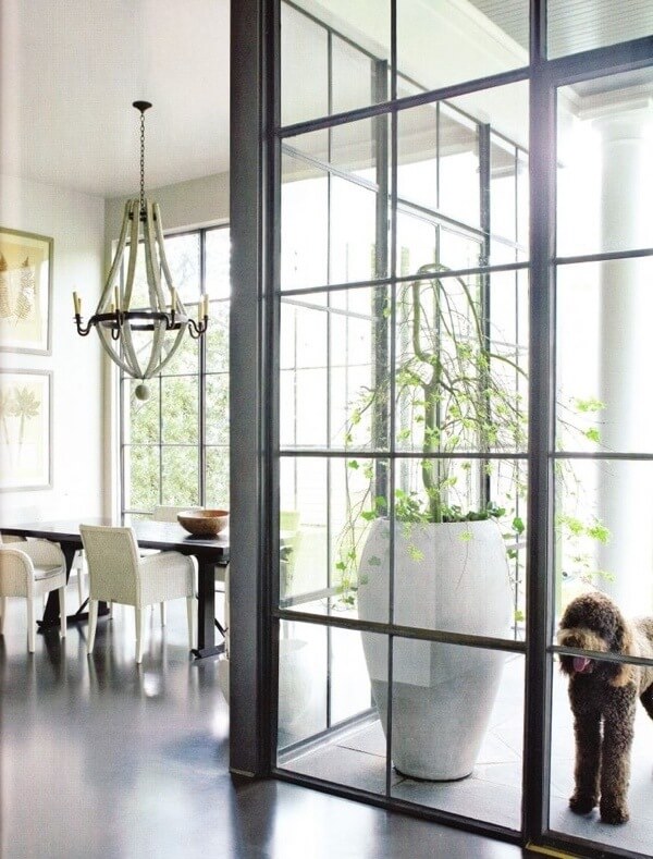 These steel and glass windows are so gorgeous ... I want to replace walls of my house with them! Just one of many steel and glass windows featured today!