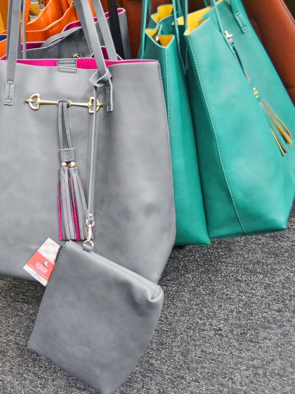 Kentucky Derby Museum Gift Shop for Derby Shopping:Totes with an accompanying approved sized clutch for $68. Comes in gray, teal, and orange.