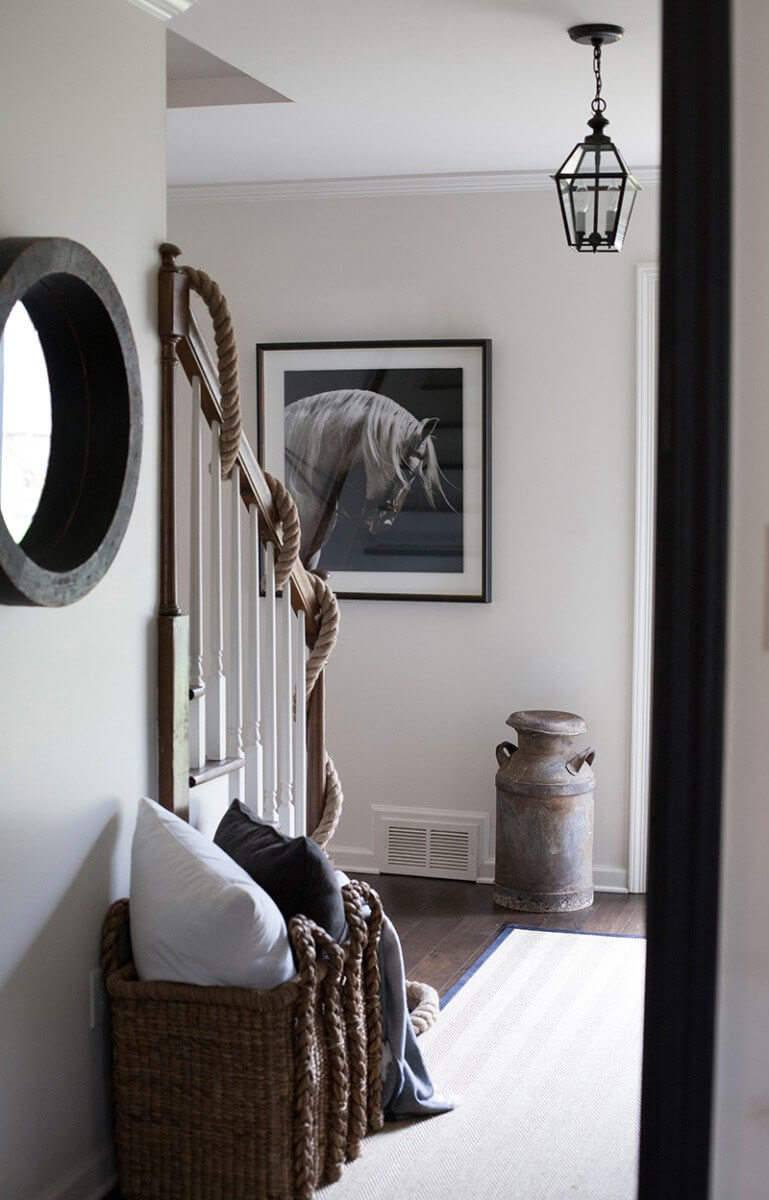 From the outside in, this house has a soothing, neutral color palette. Many of the light fixtures in Sean's home, including the entry light fixture, were found at Graham's Lighting.