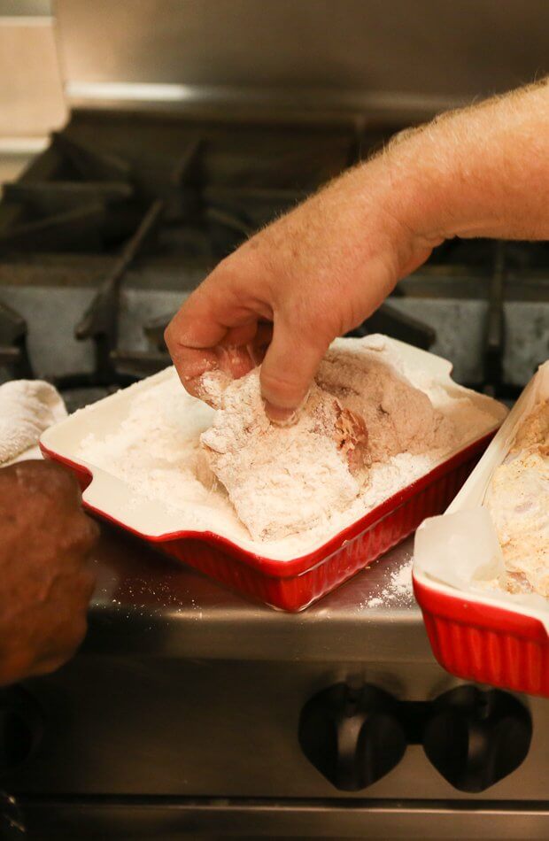 Coat the chicken and then place on a wire rack until you're ready to fry.