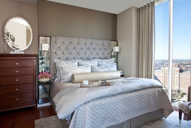 “Mount curtains as high as they will go, since this allows the eye to go upwards and helps the space appear larger,” says the designer. “We installed ripple fold curtains in the master bedroom that were mounted to the ceiling.”