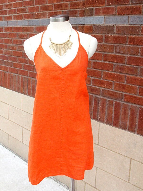The Annalyn dress from Calypso allows for dramatic jewelry.