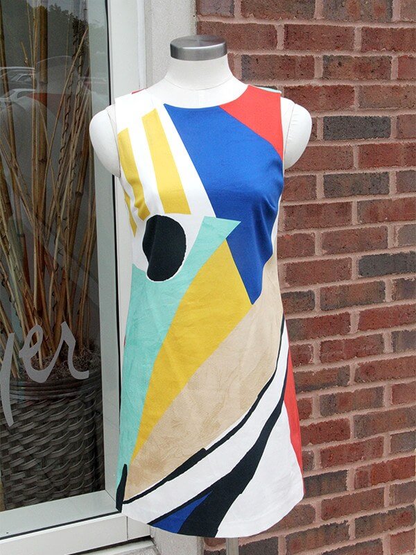A colorful sheath, like this one from Gus Mayer, is a mod approach to summer dressing