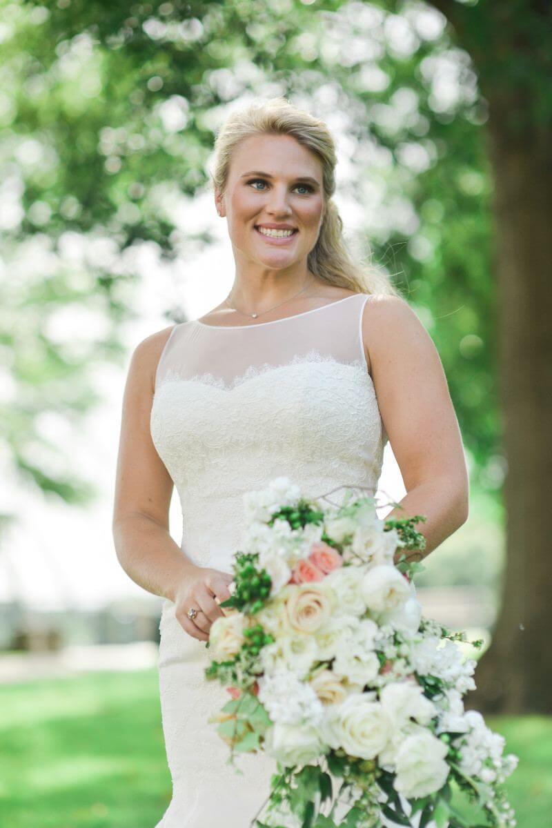Juliet's dress is a Paloma Blanca gown from Maggie Louise.