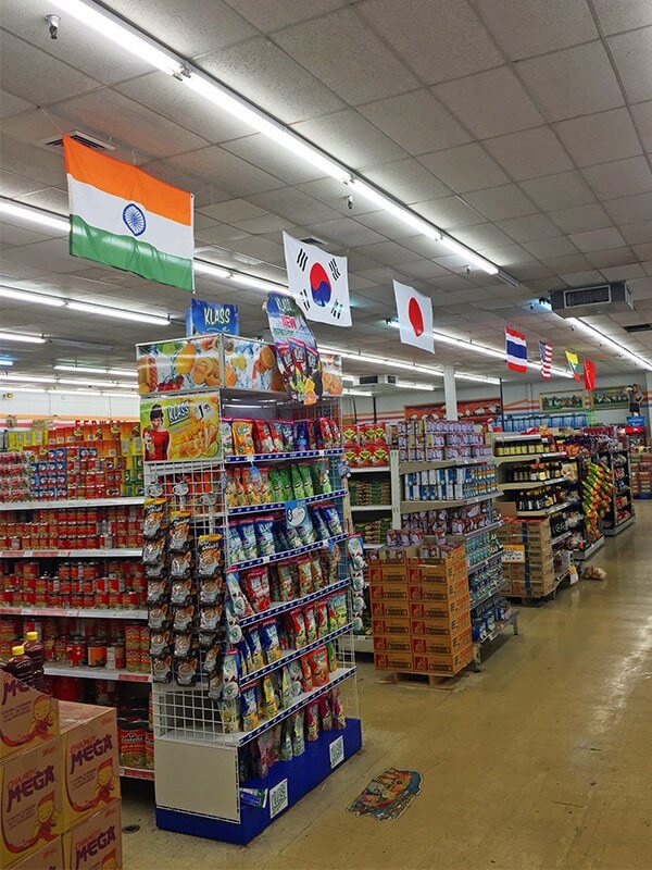 Looking down the aisles in the K&S world market grocery store in Nashville.