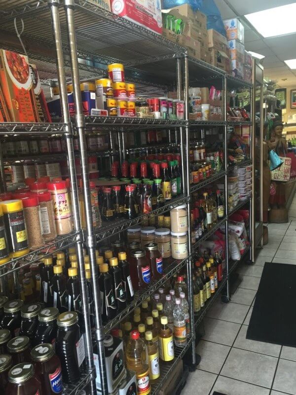 Rows of spices and oils and treats make the whole store smell like it is full of flavor!