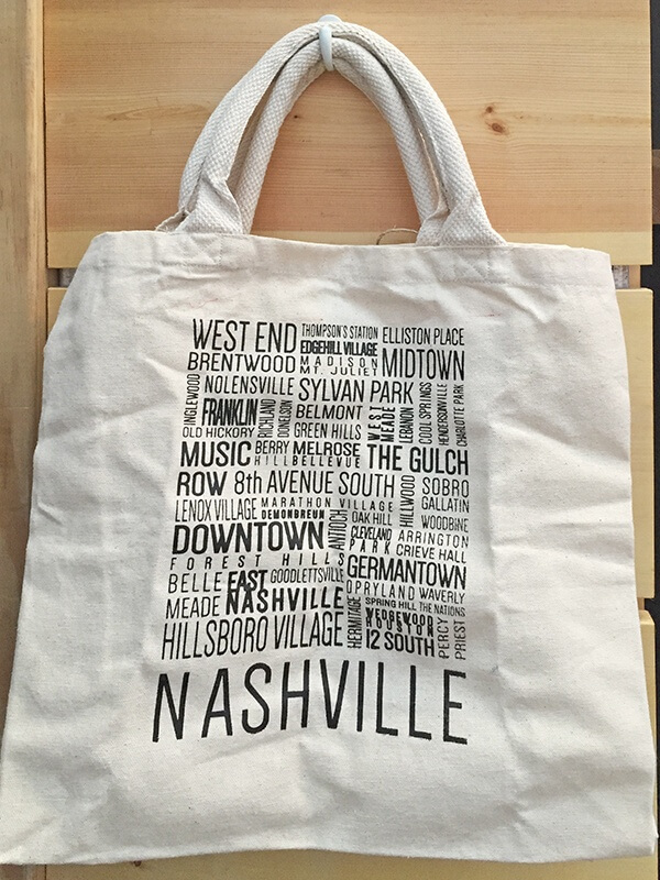 We love these canvas bags that feature all of Nashville's eclectic neighborhoods, $20 at Batch Nashville.