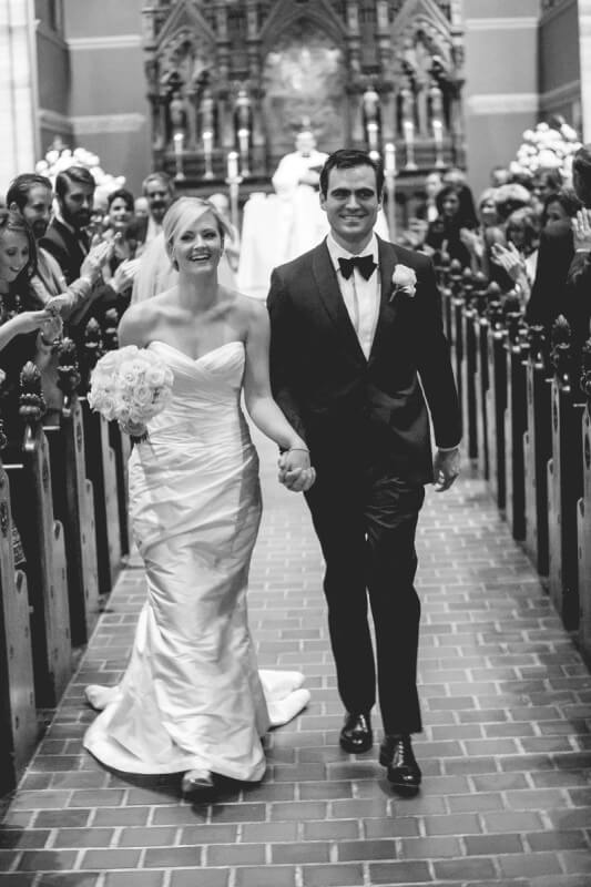 The happy couple walking back up the aisle at Christ Church Cathedral in Nashville.