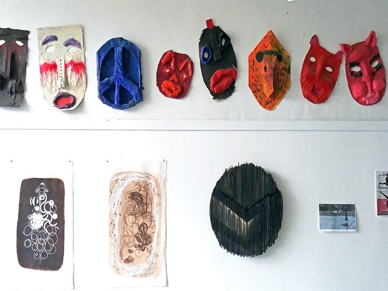 Oversized masks hang on the classroom wall in Space One Eleven on Second Avenue North in downtown Birmingham.