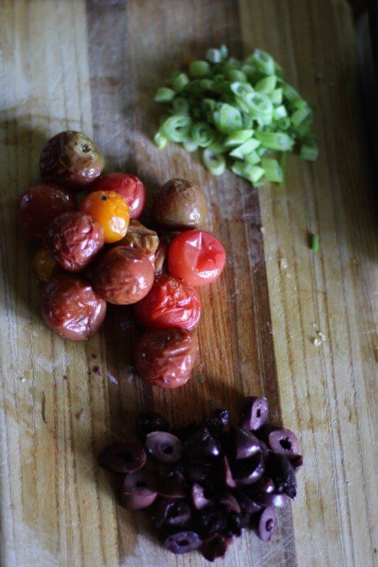 bruschetta recipe ingredients: The main ingredients are roasted tomatoes, chopped green onions and sliced kalamata olives. Like green olives? Add them! Make this your own recipe!