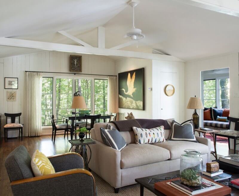 Dining furniture is finished with a black lacquer to complement a dominant Michael Crespo painting of the "Ibis." Campbell says, "We knew Michael, and he was such a nice guy. The painting has hung in several homes along the way, but here is where it belongs." 