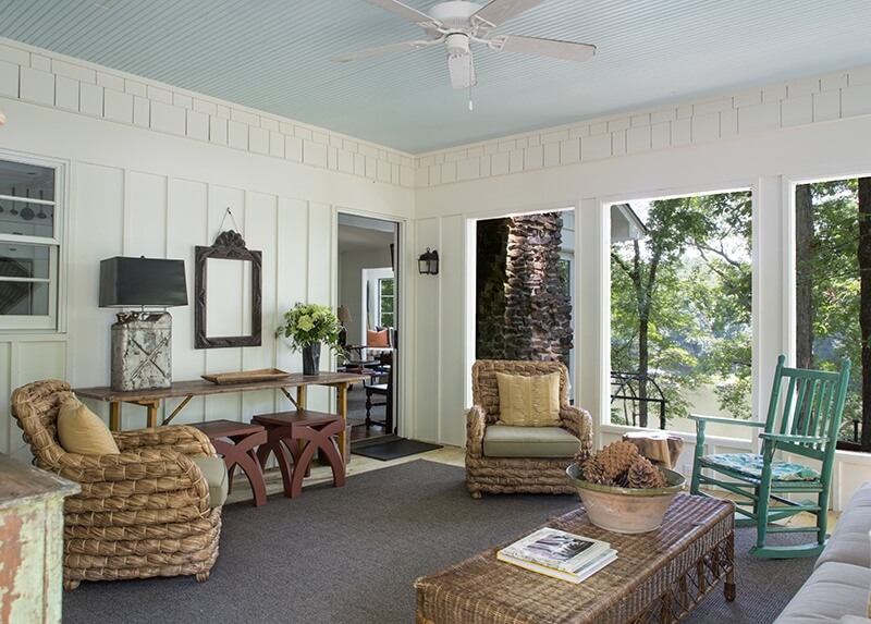 Windows on all sides facing the lake create a transparent, panoramic view of the outdoors from the great room.