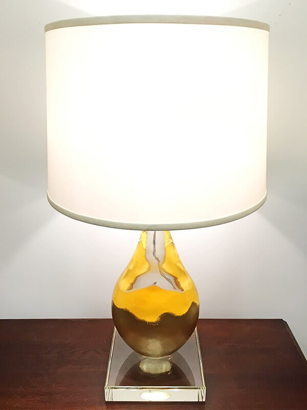 This beautiful Lumen lamp has a contemporary design, but would still sit beautifully amidst more traditional pieces.