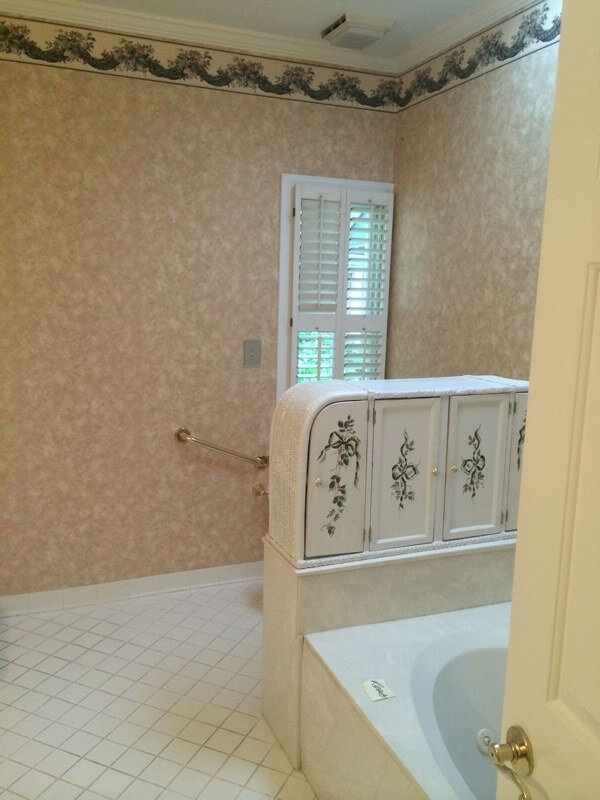 Tub before: Braund switched the location of the tub and toilet from their previous locales to highlight the freestanding tub.