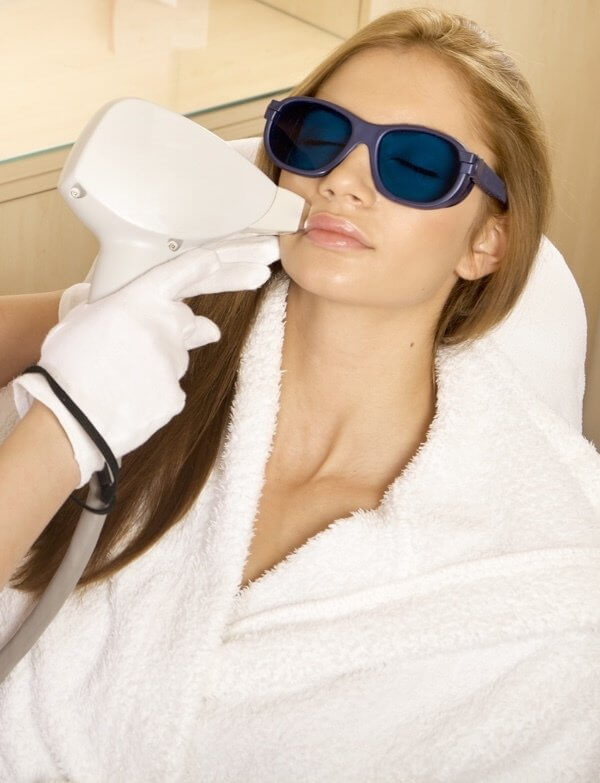 Woman getting a Refresh Laser Facial at Bella By Alethea 