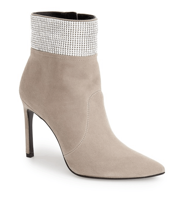 It's all in the details and these Stuart Weitzman's show that bling and booties do mix! Available in two colors, with a 4-inch heel, these will happily dress up a pair of jeans or partner with a dress and keep your toes cozy warm for $895