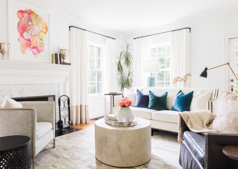 This Renovated Cottage Has Big Appeal - 2 Julie lets neutrals and rich earth tones blend easily into the cozy living room. Image: @AlyssaRosenheck