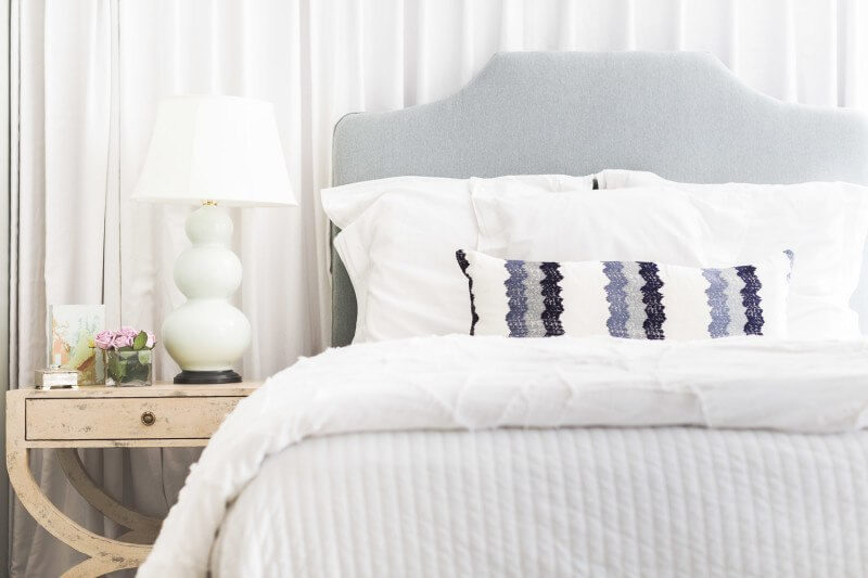 This Renovated Cottage Has Big Appeal - 15 Delicate accents bring style and shape into the serene bedroom. photo credit: @AlyssaRosenheck