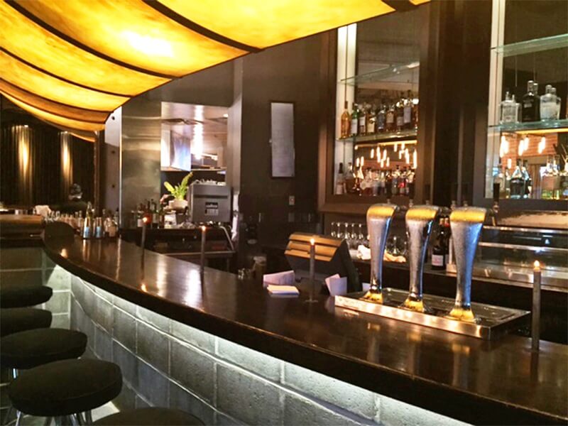 The bar at ONE oozes hip and is the perfect place to sample one of their signature artisan cocktails (like the ONE Martini) or a fine glass of wine.
